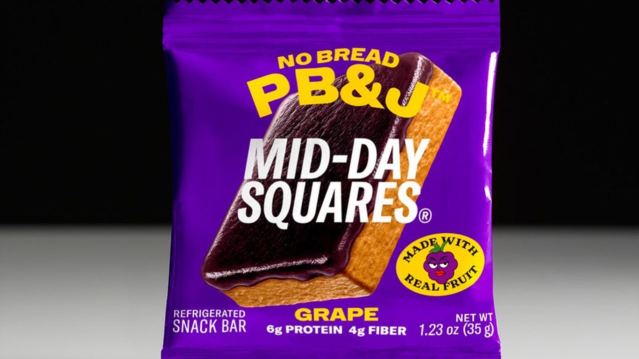 A Mid-Day Squares No Bread PB&J grape snack bar in its purple wrapper
